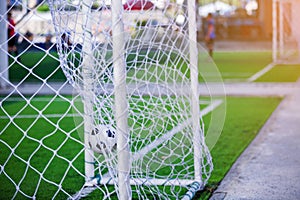 Football bounce is behind the goal line to Mesh goal.