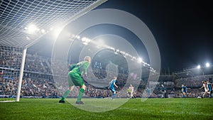 Football Championship: White Team Forward Hits the Ball and Scores Perfect Goal. Goalkeeper Jumps