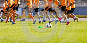 Football Club Training Session. Soccer Players on Daily Practice Unit. Athletes Running on Soccer Grass Field. Soccer Team