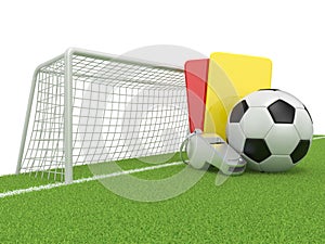 Football concept. Penalty (red and yellow) card, metal whistle and soccer (football) ball and gate