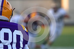 Football Defender Watches the Play