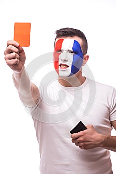 Football fan of France national football team demonstrate red card on camera