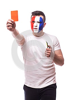 Football fan of France national football team demonstrate red card on camera