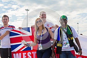 football fans of England with the national flag glorify their team in the World Cup before the match England Sweden