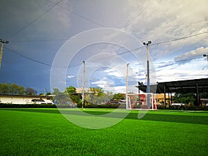 Football field, astro turf surface. Close up of throw in, kick off and corner area. Lushed green football pitch