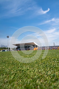 Football field ball on green grass , soccer field background texture