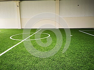 Football field - Futsal field green grass sport indoor white line center.