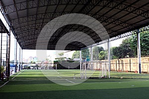 Football field Small, Futsal ball field in the gym indoor, Soccer sport field outdoor park with artificial turf