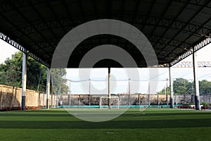 Football field Small, Futsal ball field in the gym indoor, Soccer sport field outdoor park with artificial turf