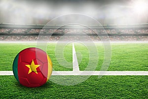 Football With Flag of Cameroon in Soccer Stadium With Copy Space