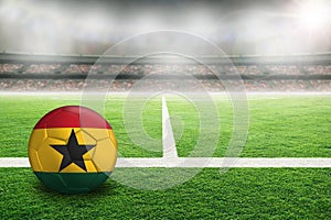 Football With Flag of Ghana in Soccer Stadium With Copy Space