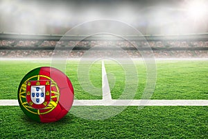 Football With Flag of Portugal in Soccer Stadium With Copy Space