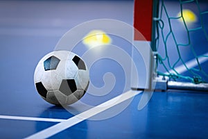 Football futsal ball goal and floor. Indoor soccer sports hall. Sport Futsal background photo