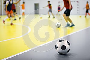 Football futsal ball goal and floor. Indoor soccer sports hall. Sport Futsal background. Indoor Soccer Winter League