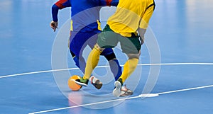 Football Futsal Ball and man Team. Indoor Soccer Sports Hall. photo