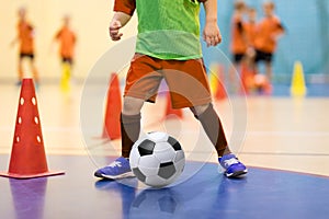 Football futsal training for children. Boys training dribble skills