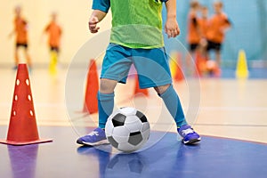 Football futsal training for children. Soccer training dribbling cone drill