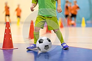 Football futsal training for children. Soccer training dribbling