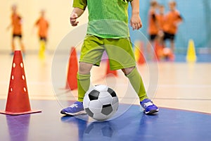 Football futsal training for children. Soccer training dribbling photo