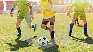 Football Game on Summer Sunny Day. Young Boys Compete in Tournament Match