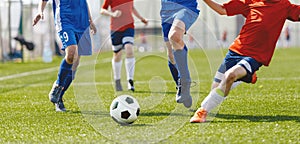 Football Game on Summer Sunny Day. Young Boys Compete in Tournament Match