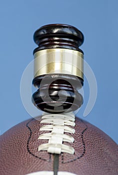 Football with gavel, legal issues
