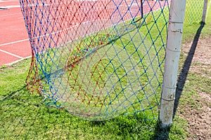 Football goal detail with a soccer