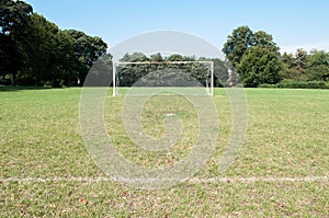 Football goal posts and net on a soccer pitch