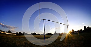 Football Goalposts Goal Posts at Sunset Sky and Bleachers Summer