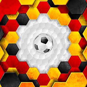 Football grunge polygonal background with soccer ball, German flag colors