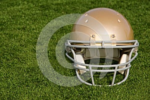 Football Helmet on Artificial Turf Facing Forward