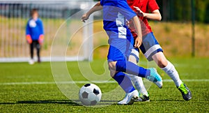 Football Match on the Pitch. Boys on Soccer Training Session