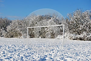 Football pitch in winter snow