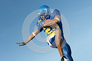 Football player in game action