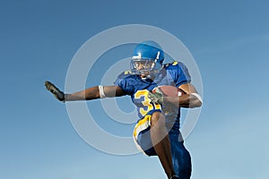 Football player in game action