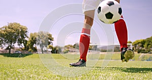 Football player playing with ball