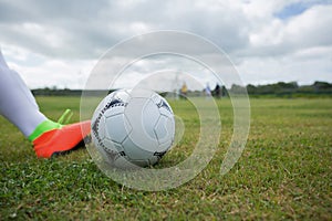 Football player ready to kick the soccer ball