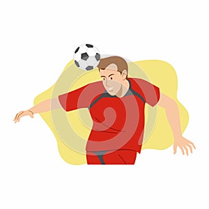 Football player in red uniforms strikes the ball with the head