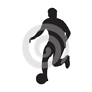 Football player running with ball, front view. Isolated vector silhouette. Soccer player