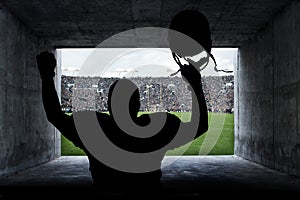 Football Player running out of the Stadium Tunnel