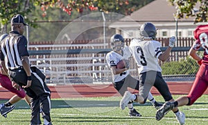 Football Player Running To Get A Touchdown