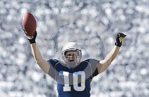 Football Player Scoring a Touchdown