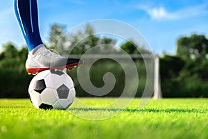 Football player set ball football on grass at freekick point before shoot or kick to win a score in international league football