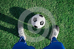 Football player set ball football on grass at freekick point before shoot or kick to win a score in international league football