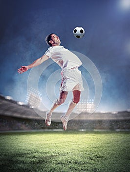 Football player striking the ball