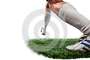 Football player tackling for the ball over white background