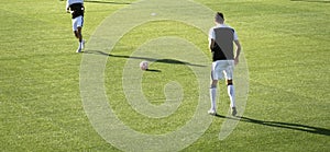 football players warming up before a football match