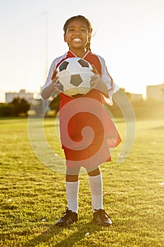 Football, portrait and girl soccer player on a sports ground ready for a ball game or training match outdoors. Smile