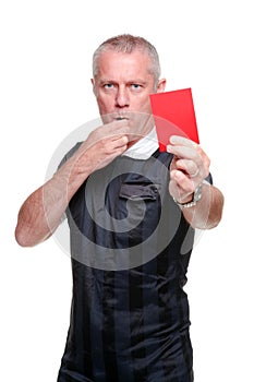 Football referee showing the red card