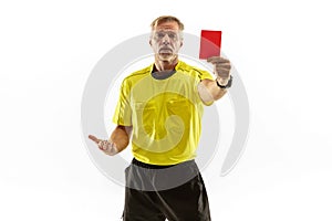 Football referee showing a red card to a displeased player isolated on white background